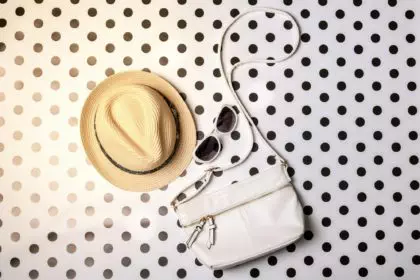 Trendy femininity accessories. Bag, hat, sunglasses, female accessories. Women's creative outfit