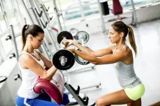 Young women have weight training in the gym